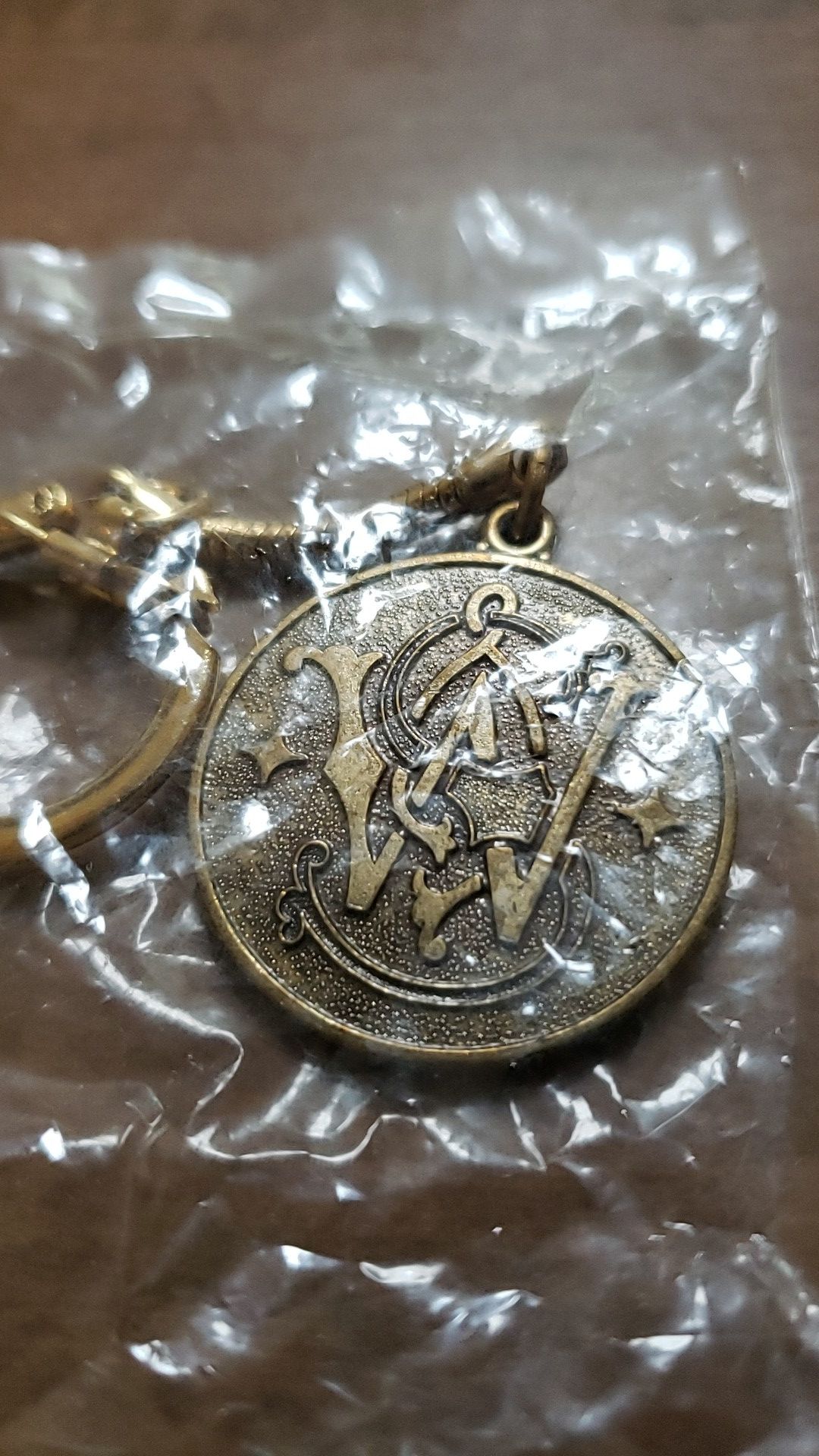 Smith and Weston pistol medallion key chain
