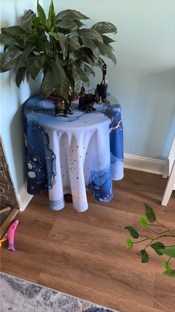 Abstract, blue and gold round tablecloth and four other items