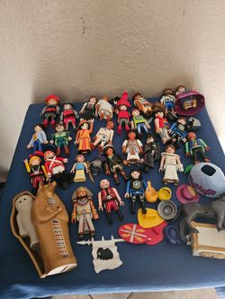 Playmobil action figures from a mixed lot.