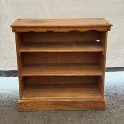 Small solid wood bookcase.