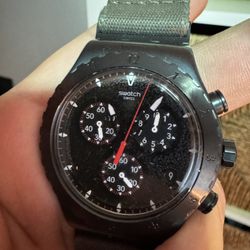 Swatch “By The Bonfire” Watch