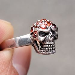 Skull ring with garnet sterling silver 