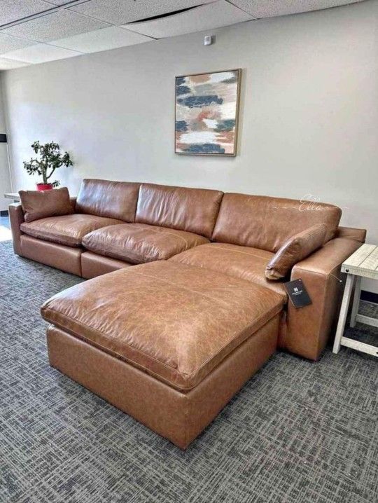 Emilia Caramel 3-Piece Sectional Sofa
And Ottoman Ashley Furniture