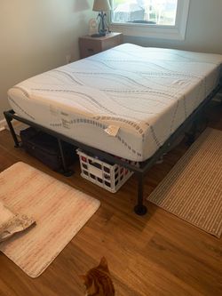 Full size bed with memory foam mattress and metal frame