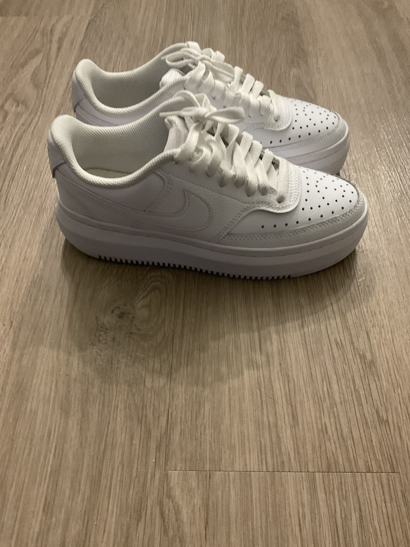 Nike Court Vision Alta Leather platform sneakers in triple white
