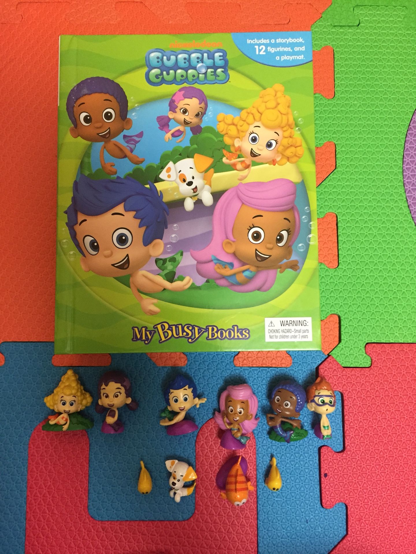 Bubble Guppies figurines and book