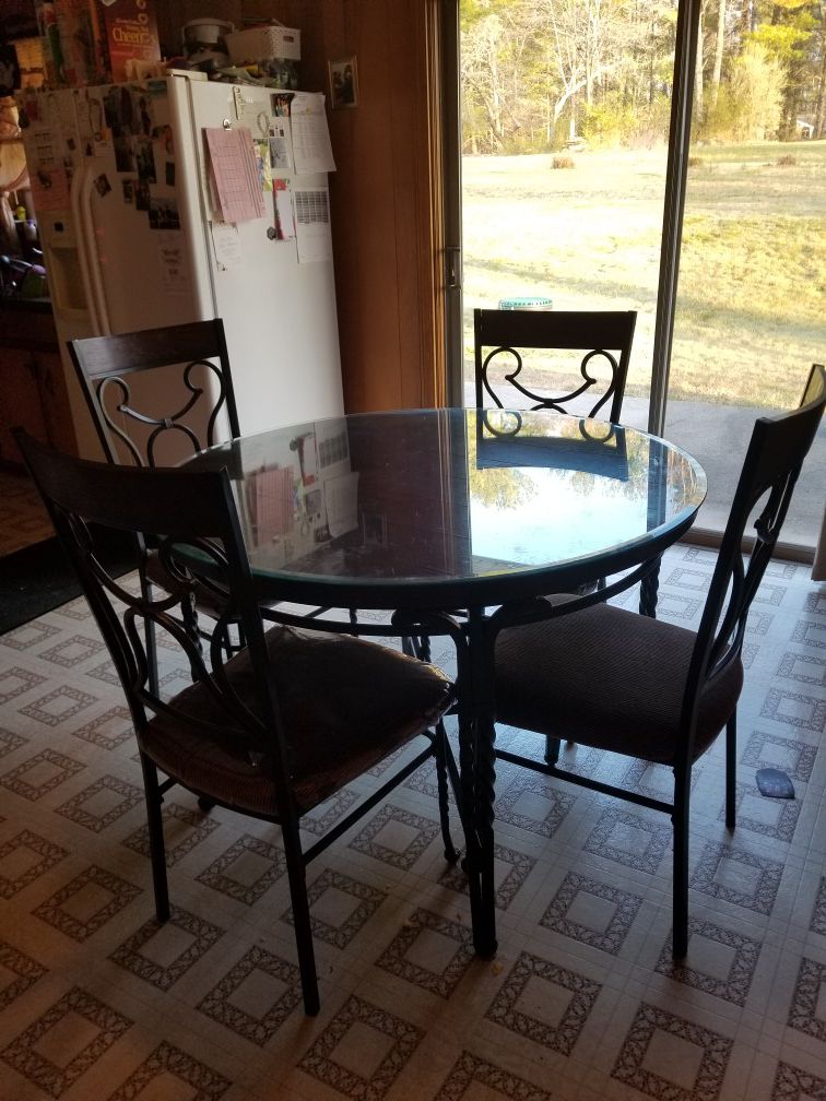Table with 4 chairs- glass not include
