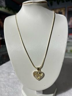 Cadena y medalla oro laminado
