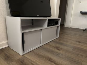 TV STAND WITH SHELVES AND SLIDING CABINETS