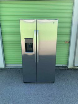 GE Stainless Steel Refrigerator; Side by Side 