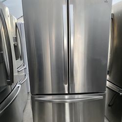  General Electric beautiful stainless steel refrigerator looks like new French door everything works perfectly first come first served 