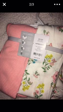 Brand new pink baby girl swaddles