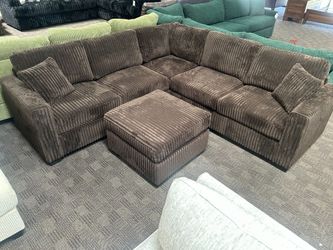 Chocolate brown comfy sectional and ottoman