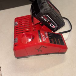 (1) GENUINE M18 Milwaukee 48-11-1828 3.0 Battery, (1) Charger 18 Volt 48-59-1812