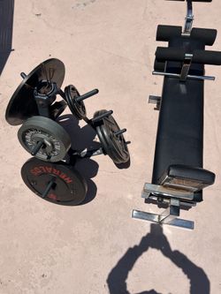Professional bench with the attachment also lots and lots of weights
