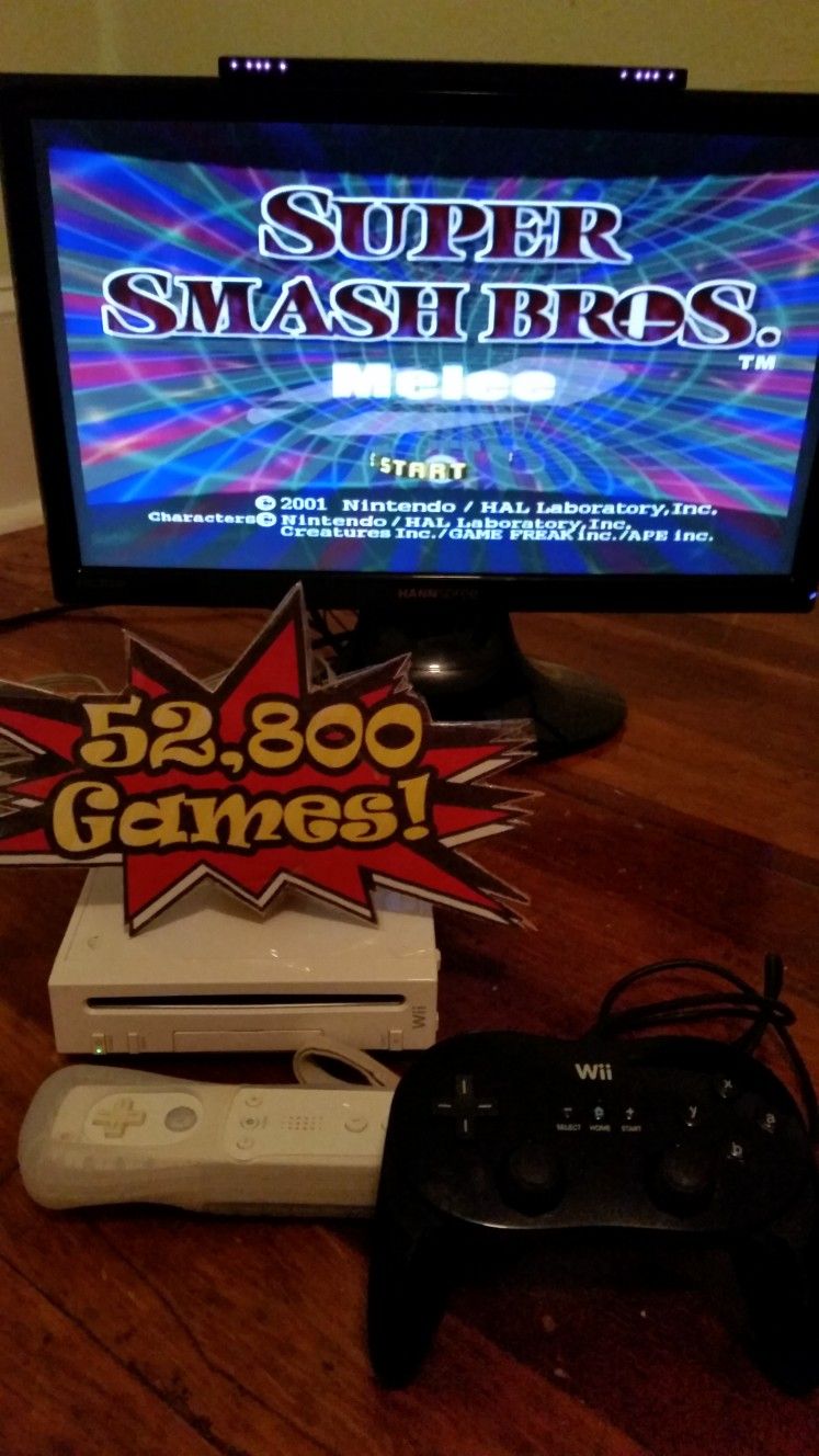 Nintendo Wii with 52,800 Games, Remote, Classic Controller Pro - Super SNES Sega Genesis N64 64 Gameboy GameCube Atari