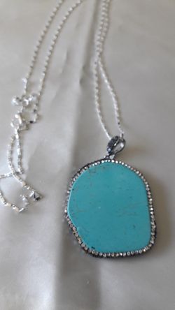 Turquoise pandent and Sterling Silver chain 30" long