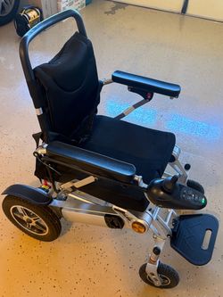 Folding Electric Wheelchair – Good Condition
