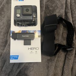 GoPro HERO black with sims & adapter, head band, chord in box