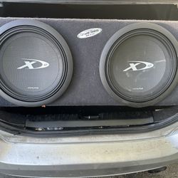 Alpine 12” X12 subwoofers with two amps and four channel amp