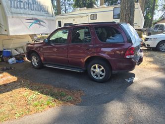 Buick SUV    v8 Burg,/Tan a/c power runs great lucky day  first  600. Takes it now!!!