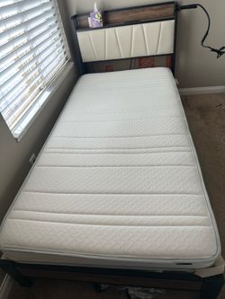 Twin bed frame and mattress
