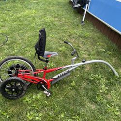Two Tag A Along Bikes. 