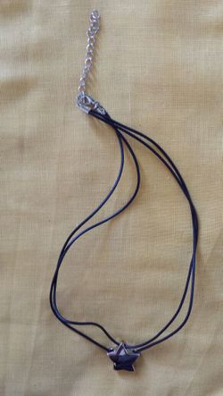 Black leather string necklace with star pendant