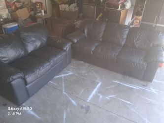 Set of black sofas
