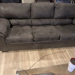 Ashley’s Signature Design By Ashley Bladen Faux Leather Sofa