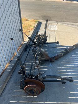 Rear suspension for a Jeep Wrangler