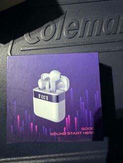 New wireless earbuds in a white charging case. This set has a digital LED battery life display on the front of the case. The earbuds are a classic in-