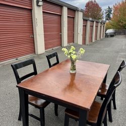 Wooden table and four chairs