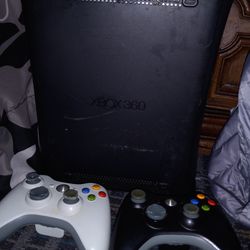Xbox360 With 2 Controls And Power Cord Works Well