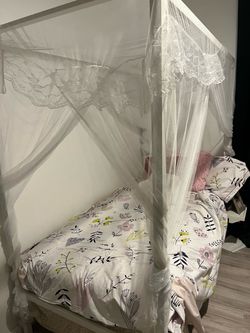 White twin bed frame with Twin mattress and Canopy
