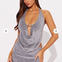 Silver mini skirt and backless top. Size Medium 8