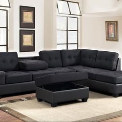 New Black Reversible Sectional And Ottoman