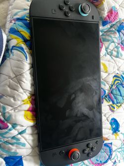 Nintendo Switch 2+game (Mario wonder)