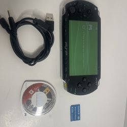 Sony PSP Go PSP-1001 PlayStation Portable - Black with game and 2gb memory card and charger