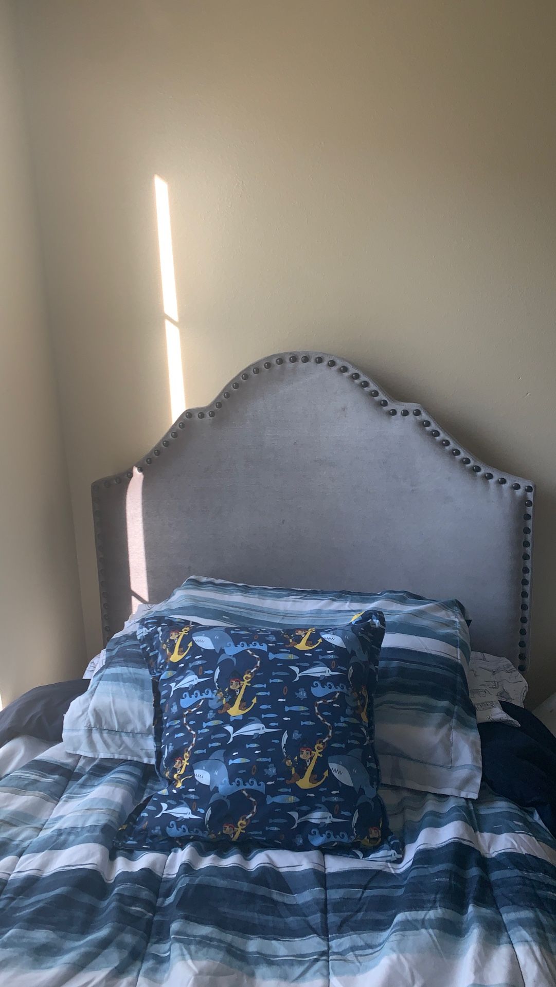 Twin (grey upholstery) headboard