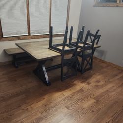 Wood table with 4 chairs and bench