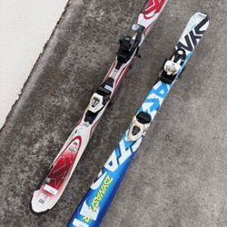 Two Pairs Of Salomon Skiis