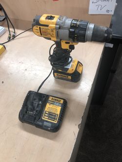 Hammer Drill , Tools-Power Dewalt W/ Charger... Negotiable