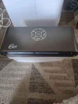 Carey vacuum sealer with bags