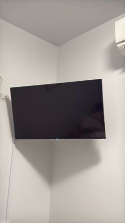 34 inch tcl Roku tv with stand and remote