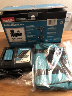 Makita New Fast Charger LIi-ion DC 18 RC and New Makita Bag.