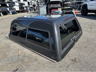 Nissan frontier camper Shell . Snugtop hi liner