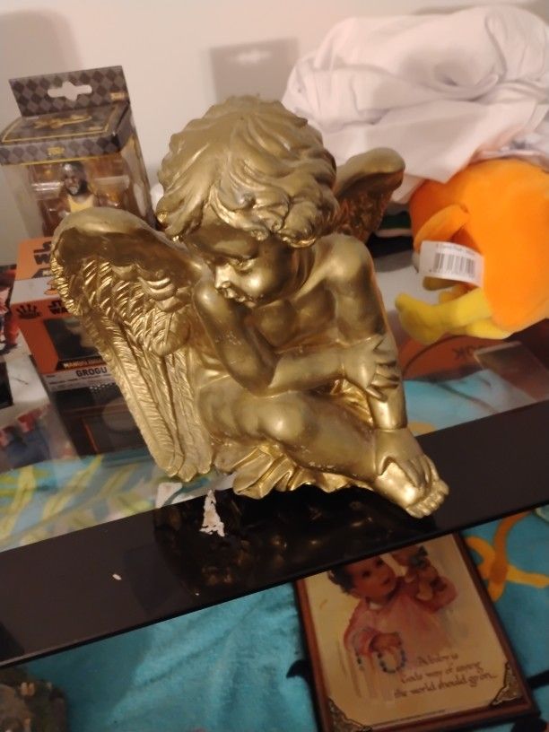 Gold And Statue