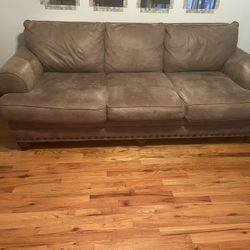 Brown Faux Leather Sofa H33”D46”L91”