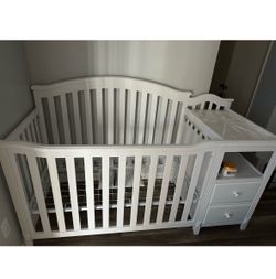 White crib with changing table for sale